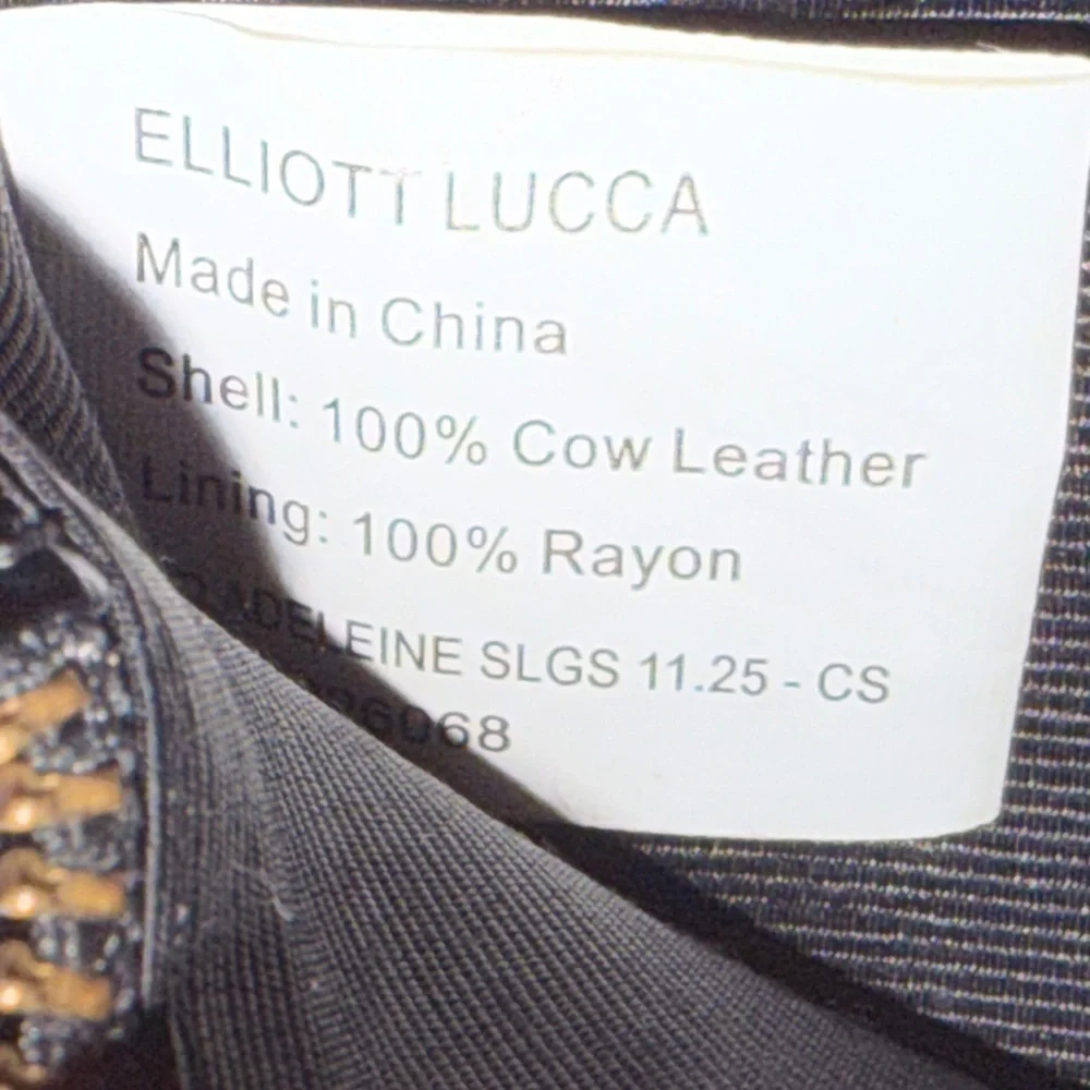 Elliott Lucca Black Cow Leather Clutch with Sliver Detail